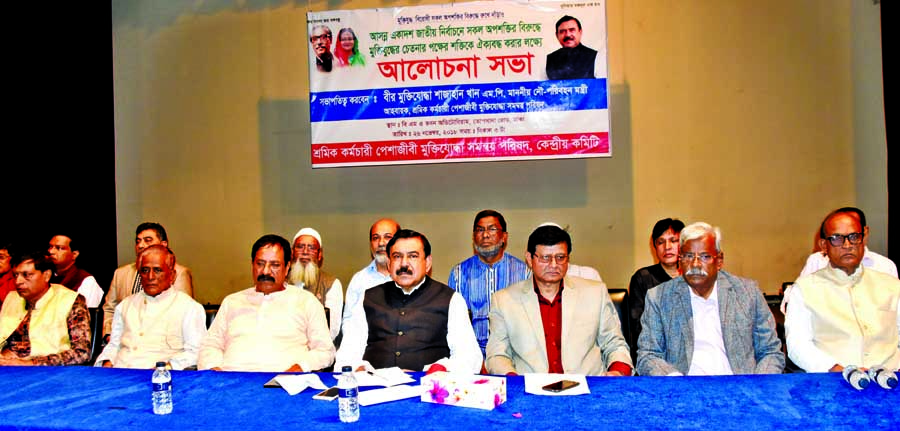 Shipping Minister Shajahan Khan speaking at a discussion organised by 'Sramik- Karmachari-Peshajibi-Muktijoddha Samonnaya Parishad' at BMA Bhaban in the city on Monday with a call to forge unity of pro-liberation forces against all evil forces in the up