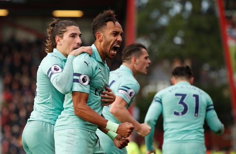 Arsenal extended their unbeaten run to 17 matches across all competitions as Pierre-Emerick Aubameyang secured a 2-1 victory at gutsy Bournemouth in the Premier League on Sunday.
