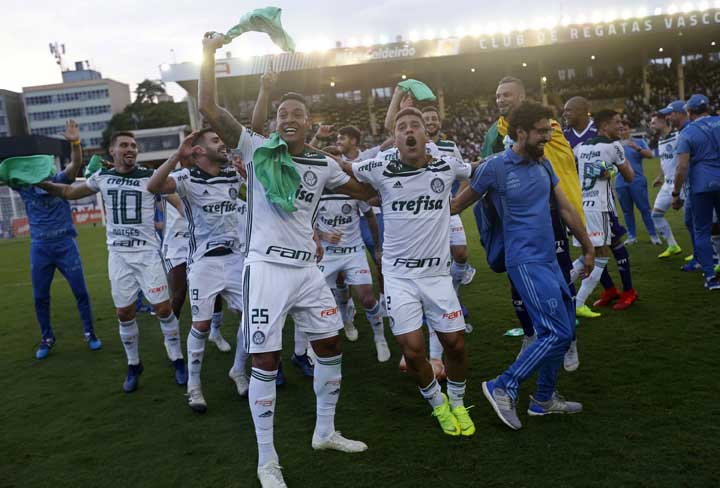 Palmeiras players celebrate winning the Brazilian championship against Vasco in Rio de Janeiro, Brazil on Sunday.