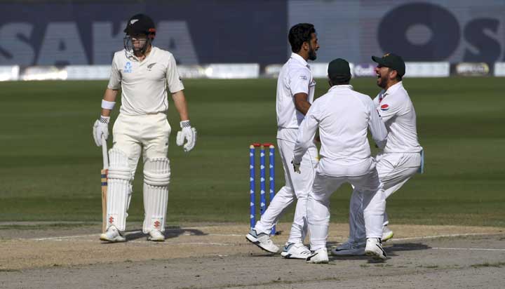 Pakistan's players react during a cricket test match against New Zealand in Dubai, United Arab Emirates on Tuesday.