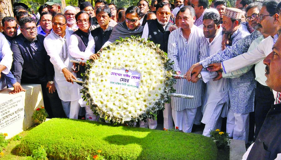 Mayor of Dhaka South City Corporation Sayeed Khokon along with other leaders of Awami League paid tributes to Mayor Mohammad Hanif by placing floral wreaths at his grave in the city's Azimpur Graveyard on Wednesday marking his twelfth death anniversary.