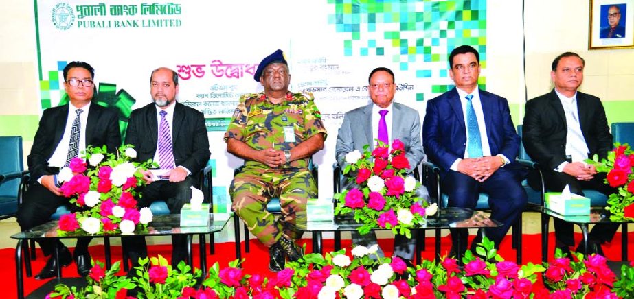 Habibur Rahman, Chairman, Board of Directors of Pubali Bank Limited along with Brig. Gen. A K M Nasir Uddin, Director of Dhaka Medical College Hospital (DMCH), poses for a photograph after inaugurating the Cash Deposit Machine (CDM) Booth and Bill Collect