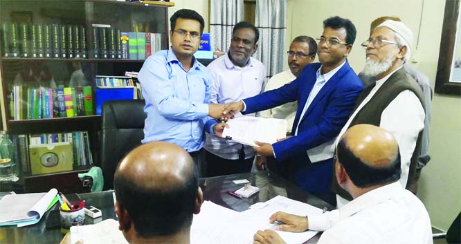 DUPCHANCHIA (BOGURA): Individual candidate Md Afzal Hossain Nayan, submitting nomination papers for Bogura-3 Constituency to Assistant Returning Officer and UNO SM Zakir Hossain on Wednesday.