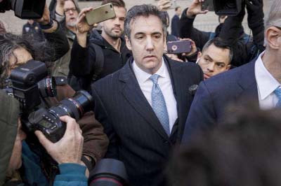 Michael Cohen, former personal attorney to President Donald Trump, exits federal court on Thursday in New York City.