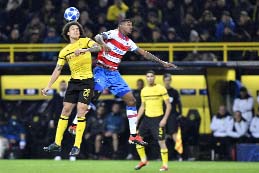 Dortmund's Axel Witsel (left) and Brugge forward Wesley Moraes challenge for the ball during the Champions League group A soccer match between Borussia Dortmund and Club Brugge in Dortmund, Germany on Wednesday.
