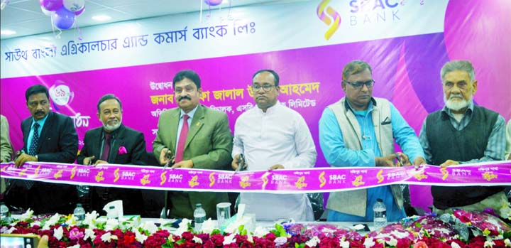 Mostafa Jalal Uddin Ahmed, Additional Managing Director of South Bangla Agriculture and Commerce (SBAC) Bank Ltd, inaugurating its 69th branch at Nazipur in Patnitola of Naogaon on Thursday. Md. Hafizur Rahman, General Manager of the Bank presided over th