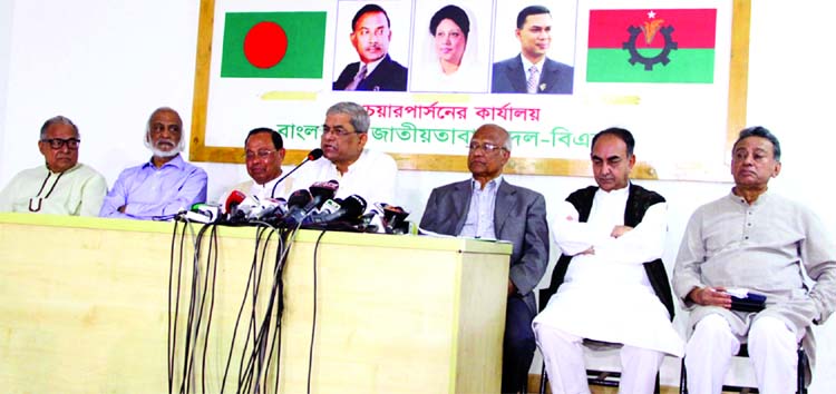 BNP Secretary General Mirza Fakhrul Islam Alamgir speaking at a press conference at Chairperson's Gulshan office on Friday protesting filing of fictitious cases and arrest of party leaders and activists across the country ahead of parliamentary elections