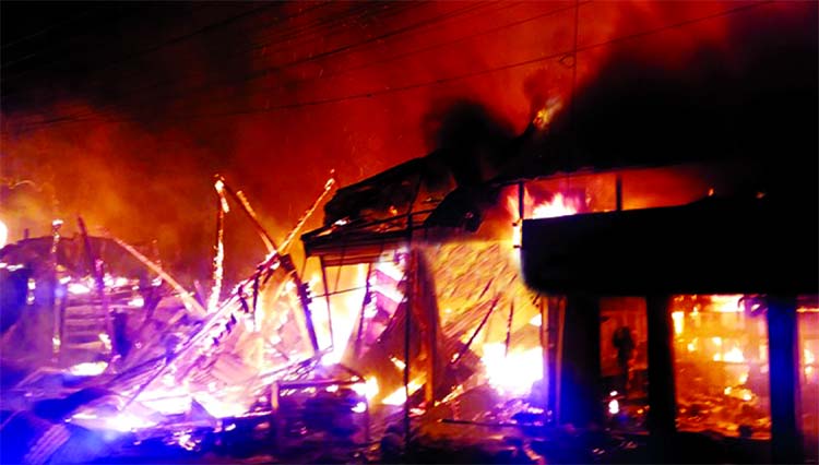 Two workers of a sweetmeat shop were burned to death in a devastated fire that broke out at Palong Bazar in Sadar upazila of Shariatpur on Friday.