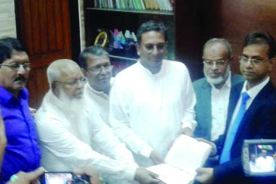 CHANDPUR : BNP nominated candidate for Chandpur-3 Constituency Sk Farid Ahmed Manik submitting nomination paper to Returning Officer Md Majedur Rahman Khan on Wednesday.