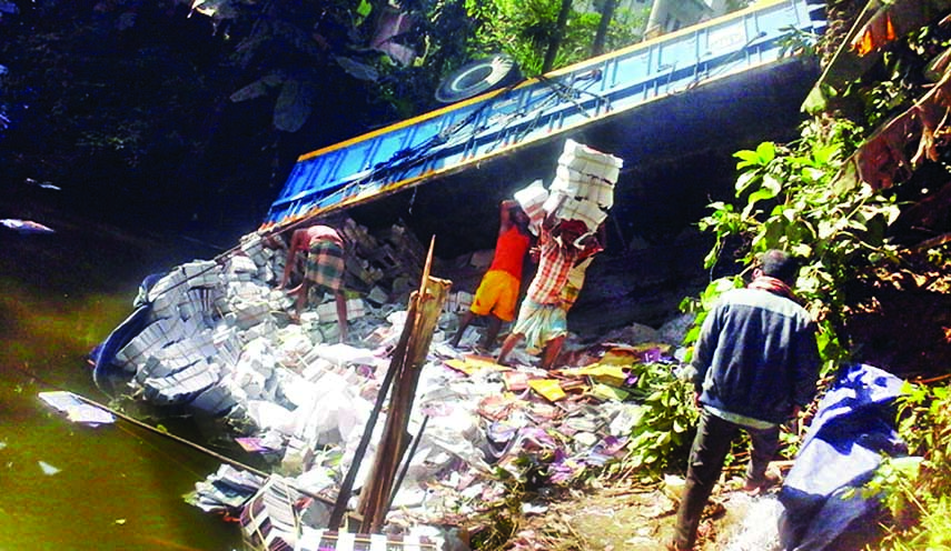 A books laden truck carrying about 1.21 lakh text books for Class-8 skided into a roadside ditch at Kalihati area in Tangail on Saturday, most of the books were damaged.