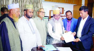 SYLHET: M Kazi Emdadul Islam, Returning Officer receiving nomination of Jatiya Oikyafront nominated candidate Moulana Habibur Rahman for Sylhet-6 Seat on Wednesday.