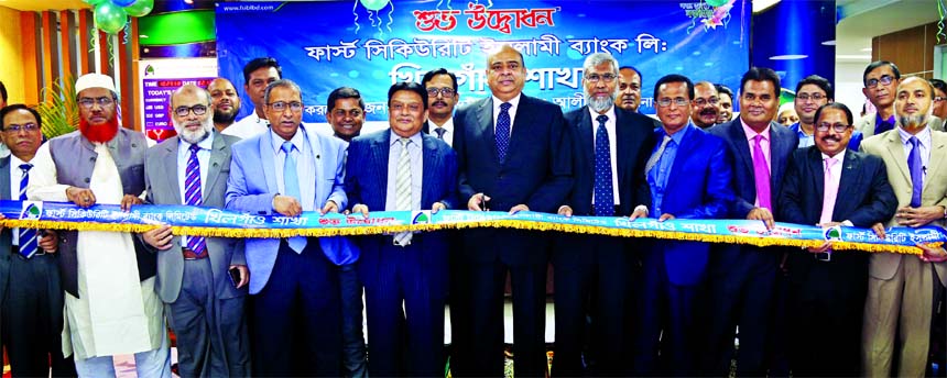 Syed Waseque Md Ali, Managing Director of First Security Islami Bank Limited, inaugurating its new branch at city's Khilgaon area on Sunday. Abdul Aziz, AMD, Md. Zahurul Haque, DMD, senior officials of the Bank and local elites were also present.