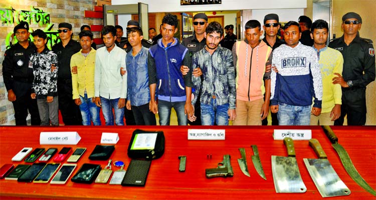 Nine members of abductors' gang were arrested with some locally made weapons from Ashulia area by RAB-1. This picture was taken from RAB media office on Sunday.