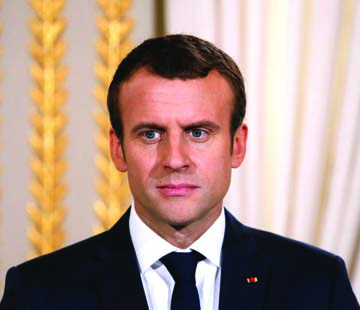 French President Emmanuel Macron appears determined not to roll back the unpopular fuel tax hikes.