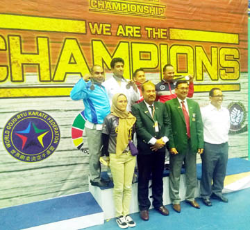 Members of Bangladesh Goju Ryu Karate team pose for a photo session at the Gor Popki Sports Hall in Jakarta, Indonesia recently. Karatekas from Bangladesh gained one silver medal and one bronze medal in their respective categories.