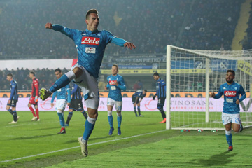 Napoli's Arkadiusz Milik celebrates after scoring a goal during the Italian Serie A soccer match between Atalanta and Napoli in Bergamo, Italy on Monday.