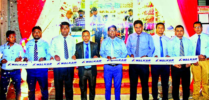 RN Paul, Managing Director of RFL Group, inaugurating a new outlet of Walkar, Footwear brand of the group, at city's Mohammadpur Krishi Market recently. Kamrul Hasan, Chief Operating Officer, Fahim Hossain, Head of Marketing and Mainul Hassan, Brand Mana