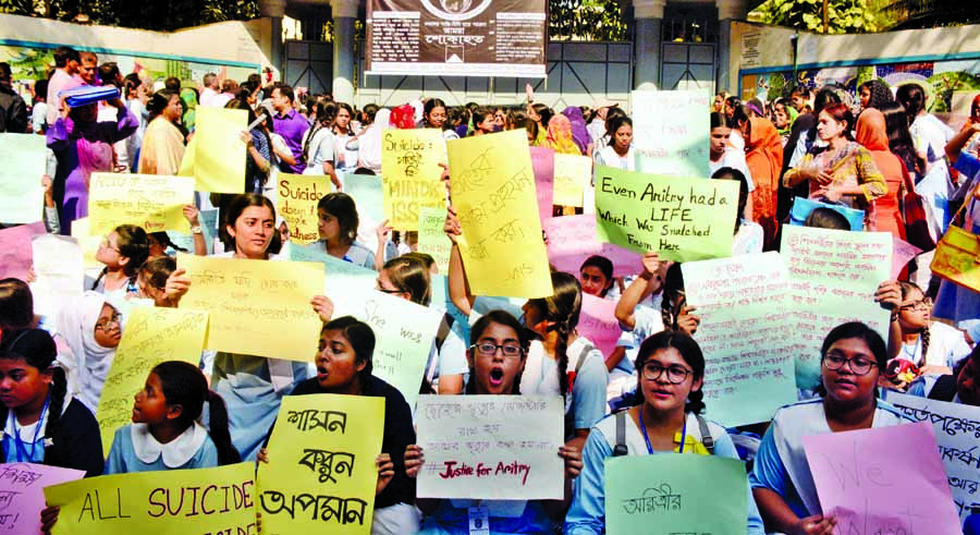 Students of Viqarunnisa Noon School and College continued demonstration in front of the school boycotting classes and examinations, demanding exemplary punishment to those responsible for their fellow Aritree's suicide incident. This photo was taken from
