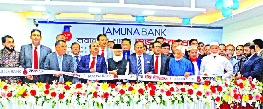 Eng. AKM Mosharraf Hussain, Chairman of Jamuna Bank Limited, inaugurating its 129th branch at Nababpur in the city on Thursday. Nur Mohammed, Chairman of Jamuna Bank Foundation, Shafiqul Alam, Managing Director, Md. Ismail Hossain Siraji, Director, Mirza