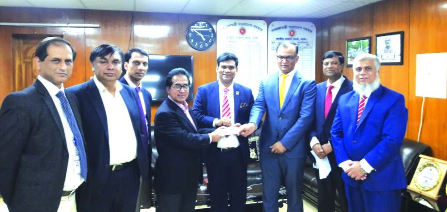 Shiekh Nasir Uddin, Chairman and Sk Bashir Uddin, Managing Director of Akij Group, handing over a cheque of Tk. 200 crore to Mosharraf Hossain Bhuiya, NBR Chairman which is an initial and partial payment of Capital Gain Tax that has arisen due to the shar