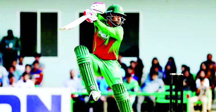 Tamim Iqbal plays a shot during the one-day practice match between Bangladesh Cricket Board (BCB) XI and West Indies at the BKSP Ground in Savar on Thursday.
