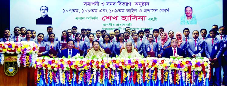 Prime Minister Sheikh Hasina at a photo session with the trainees at the closing ceremony of 107th, 108th, and 109th Law and Administrative Courses of Bangladesh Civil Service Administration in its Academy in the city on Thursday.