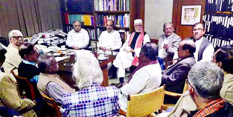 Jatiya Oikyafront steering committee members holding talks at the office of Dr Kamal Hossain's Motijheel office protesting mass arrest and announcement of election manifesto on Thursday.