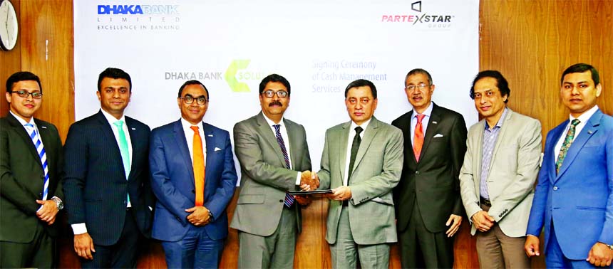 Md. Ziaur Rahman, Head of Corporate Banking Division of Dhaka Bank Limited and Peyar Ahamed, Chief Financial Officer of Partex Star Group, exchanging an agreement signing document at the Banks head office in the city recently. Under the deal, the bank wil