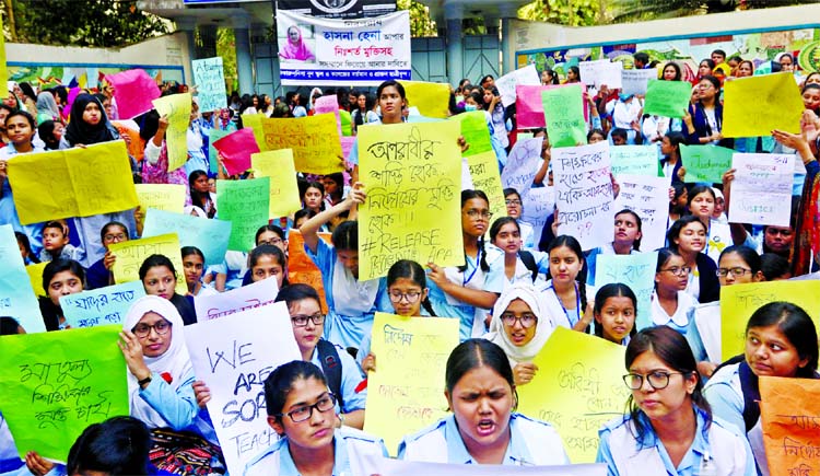 A section of students of Viqarunnisa Noon School and College staged demonstration in front of school on Friday demanding release of their teacher Hasna Hena who was sent to jail over a case of suicide by fellow Aritree Adhikary.