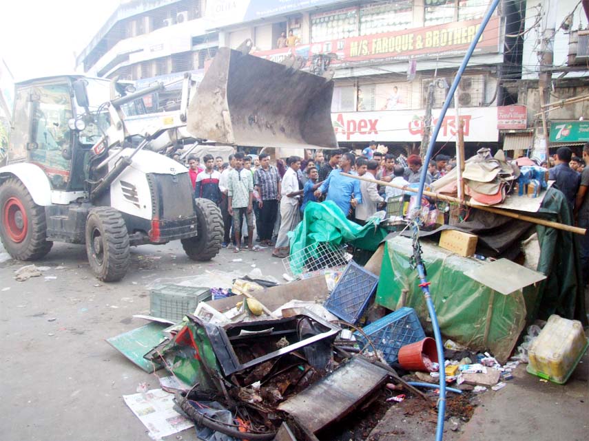 CCC Mobile court conducting evicting drive against illegal constructions from Riazuddin Bazar point on Tuesday.
