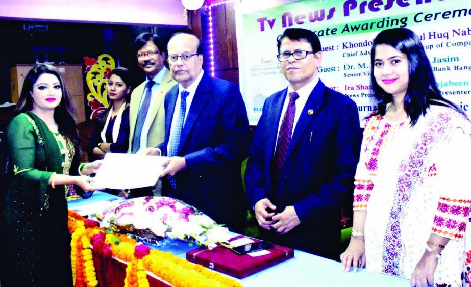 Chief Adviser of Beacon Group of Companies Khondker Rashidul Huq distributing certificates among the participants of a training course titled 'TV News Presentation' organised recently by Bangladesh Institute of Journalism and Electronic Media in its aud