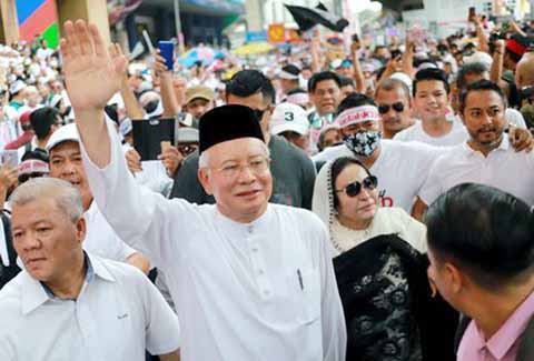 Former Malaysian Prime Minister Najib Razak and his wife Rosmah Mansor attend the Anti-ICERD (International Convention on the Elimination of All Forms of Racial Discrimination) mass rally in Kuala Lumpur, Malaysia on Saturday.