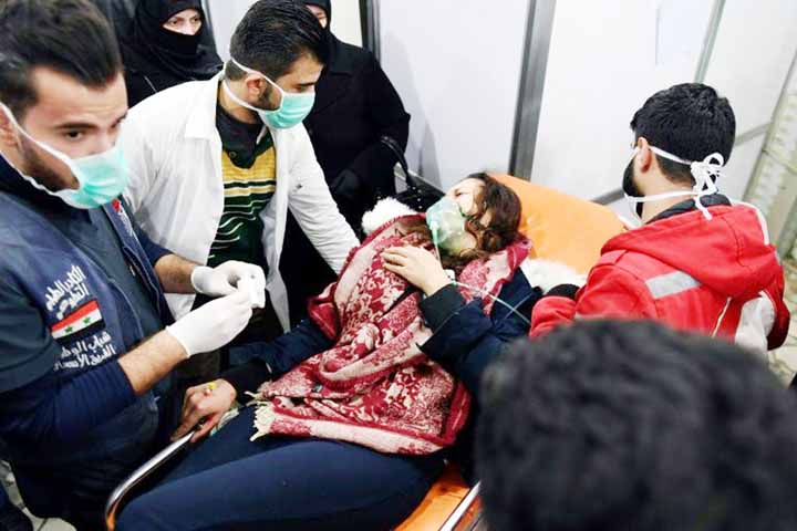 A Syrian woman receives treatment at a hospital after an assault on Aleppo, which Russia claimed was a chemical attack by rebels.