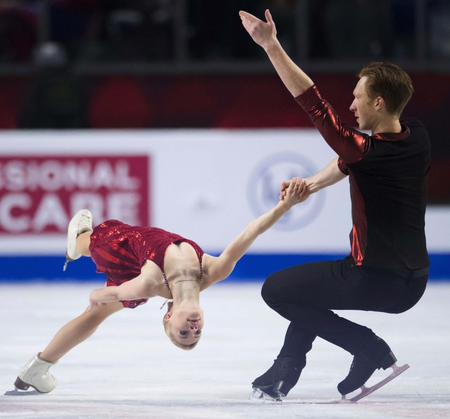 Evgenia Tarasova and Vladimir Morozov, of Russia, skate during the pairs short program at figure skating's Grand Prix Final in Vancouver, British Columbia on Friday.