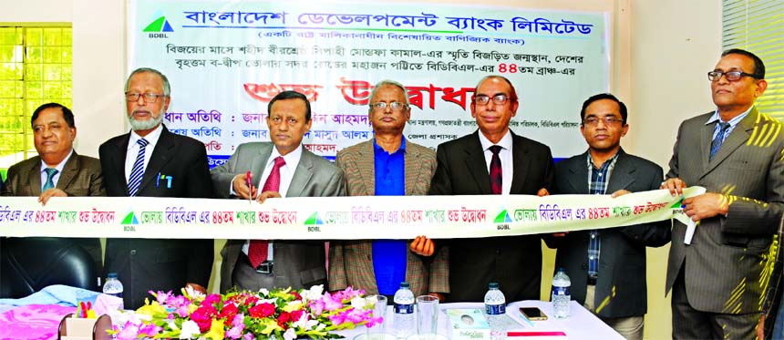 Sahabuddin Ahmed, Director of Bangladesh Development Bank Limited (BDBL), inaugurating its 44th branch at Sadar Road in Bhola Sadar on Sunday. Manjur Ahmed, Managing Director of the Bank, Mohammed Masud Alam Siddique, Bhola District Commissioner and local