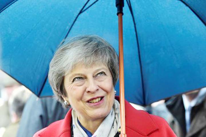 Britain's Prime Minister Theresa May tours the Royal Welsh Winter Fair at the Royal Welsh Showground in Builth Wells, Wales, Britain.