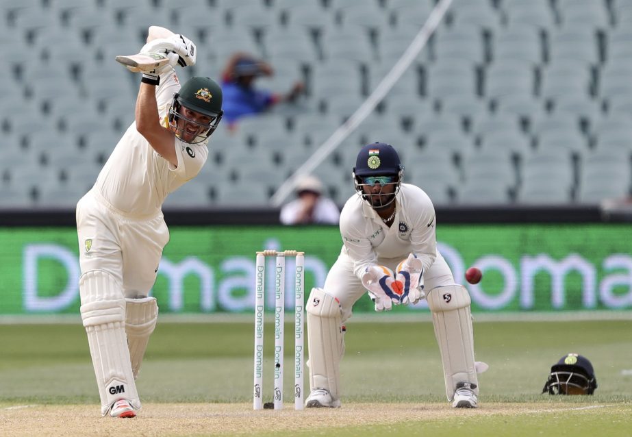 Australia's Travis Head bats on day four during the first cricket test between Australia and India in Adelaide, Australia on Sunday.