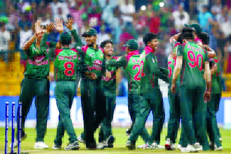 Players of Bangladesh Cricket team celebrating after beating West Indies in their first One Day International match at the Sher-e-Bangla National Cricket Stadium in the city's Mirpur on Sunday.