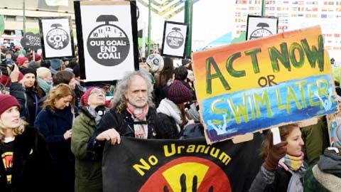 The US and Saudi Arabia rank last when it comes curbing greenhouse gas emissions, according to a survey prepared for the Climate Change summit in Katowice, Poland where protestors demand more action