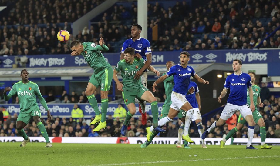 Watford's Jose Holebas heads the ball during the English Premier League soccer match against Everton at Goodison Park, Liverpool, England on Monday.