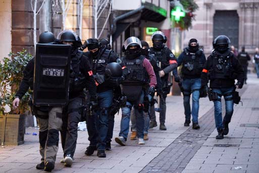 The government raised the security alert level for terrorism to its highest, reinforcing border controls and those around all Christmas markets across France.