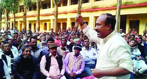 KISHOREGANJ: Minister for Labour and Manpower and 14- Party Alliance candidate for Kishoreganj -3 Seat Mujibur Hoque Chunnu MP addressing an election campaign at Tarail Muktijoddha Govt College compound recently.