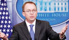 White House budget director Mick Mulvaney speaking at a press briefing.