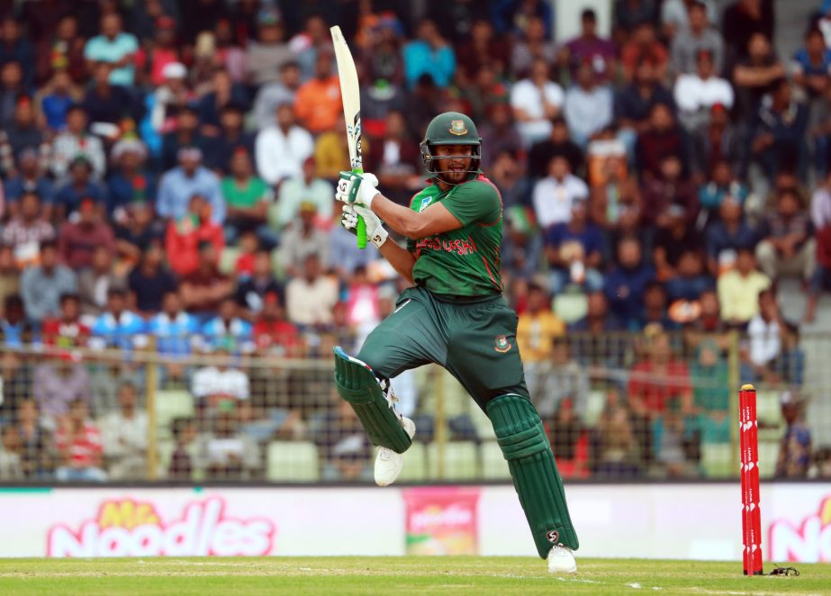 Shakib Al Hasan plays a shot during the first Twenty20 International match between Bangladesh and West Indies at Sylhet International Cricket Stadium on Monday. Shakib scored 61 runs.