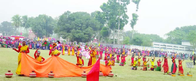 MADHUKHALI(Faridpur): Students of Ayesha Ali Model School displaying at Madhukhali Pilot High School compound in observance of the Victory Day organized by Upazila Administration on Sunday.