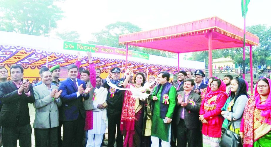 GOURIPUR(Mymensingh): Farhana Karim, UNO inaugurating march- past organised by Upazila Administration at Gouripur Stadium to mark the Victory Day on Sunday.