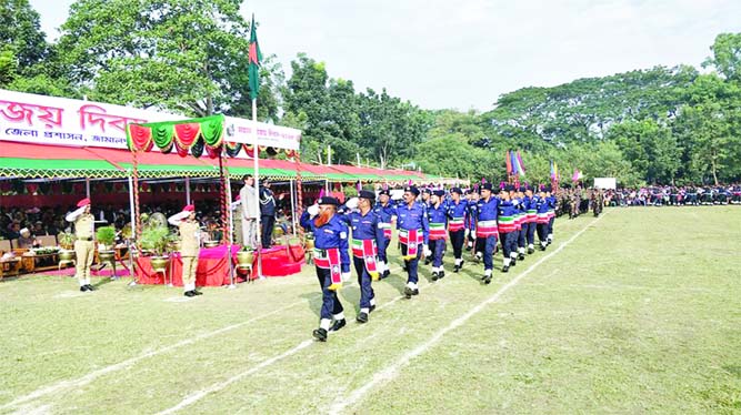 JAMALPUR: Ahmed Kabir, DC and Delwar Hossain, SP, Jamalpur taking salute during a display marking the Victory Day at Zilla School premises on Sunday.