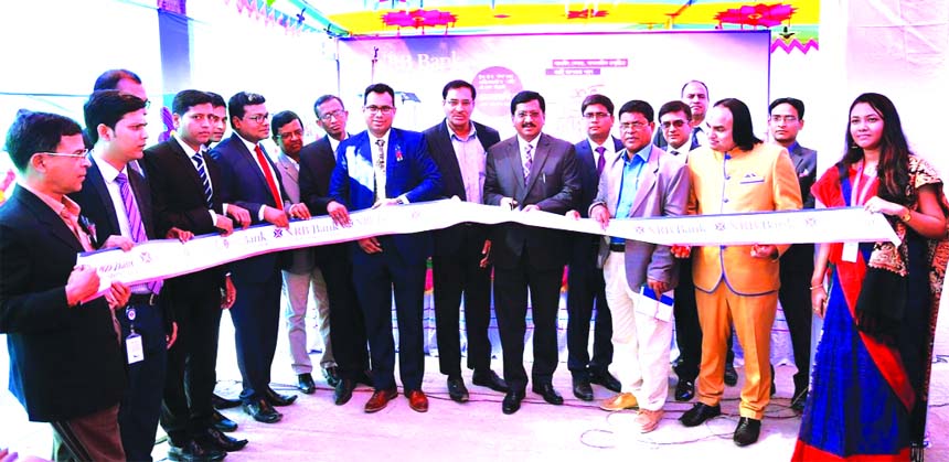 Md. Mehmood Husain, CEO of NRB Bank Limited, inaugurating its 38th branch at Ishwardi in Pabna recently. Imran Ahmed, COO, Rahat Shams, Head of Retail Banking and Mohammed Abu Sayem, Head of SME Banking of the Bank among others were also present.