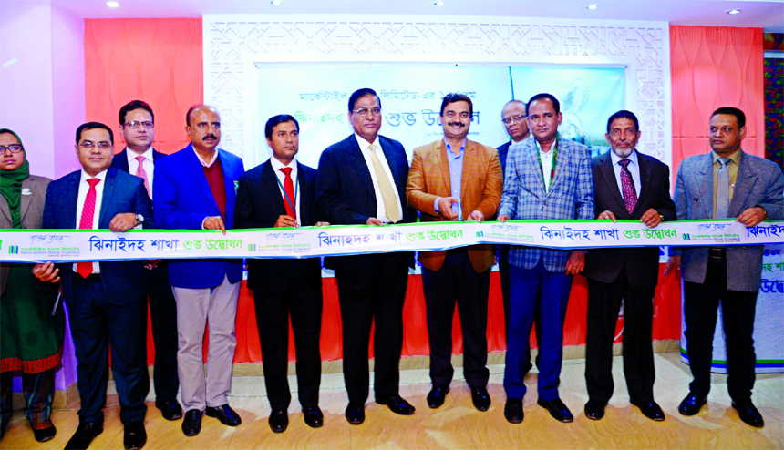 Soroj Kumar Nath, Deputy Commissioner of Jhenaidah, inaugurating the 134th Branch of Mercantile Bank Limited, at Jhenaidah on Tuesday as chief guest. Dr. Md. Nurul Islam, CFO and other senior officials of the Bank and local elites were also present.