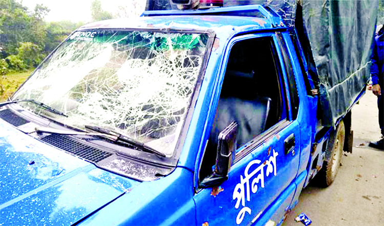Miscreants vandalised a police car at Sakhipur in Tangail on Tuesday night. Four people including two policemen were injured in the incident.